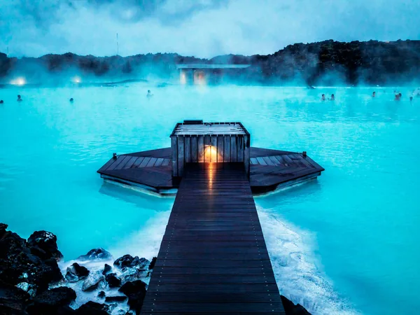 The Blue Lagoon geothermal spa with steam rising off milky blue water