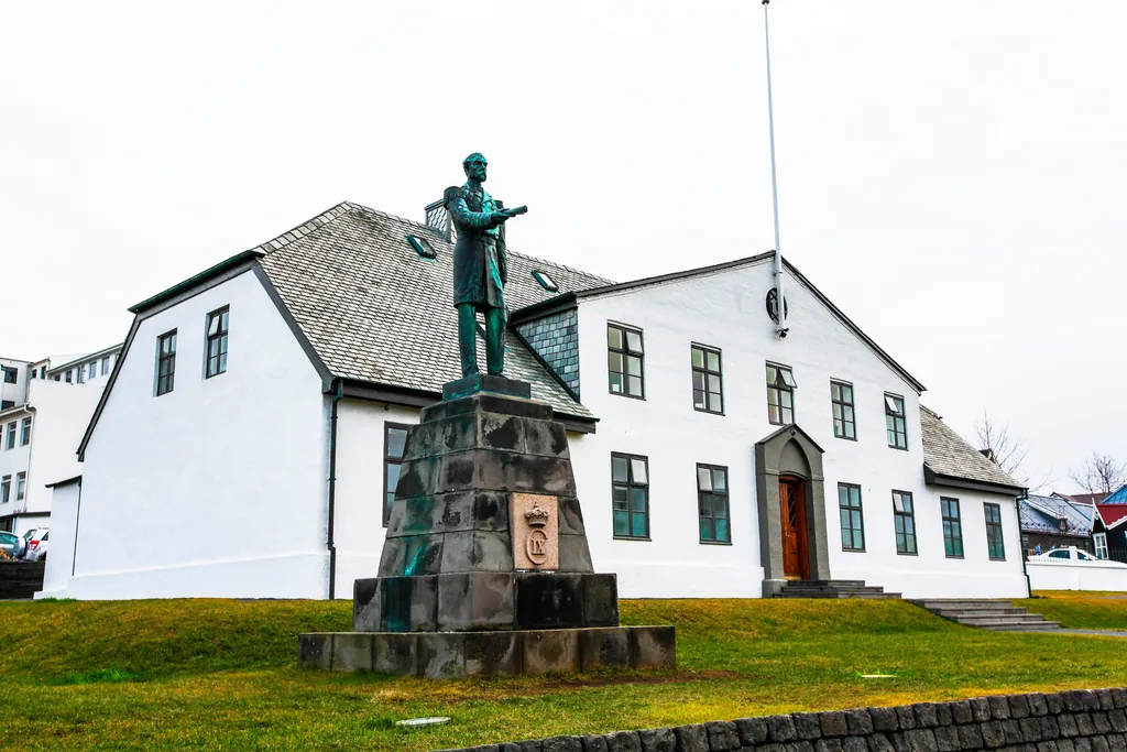 Government House in Reykjavik with the statue of Ingólfur Arnarson's successor in front